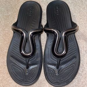 Crocs flip-flops, women’s size 8